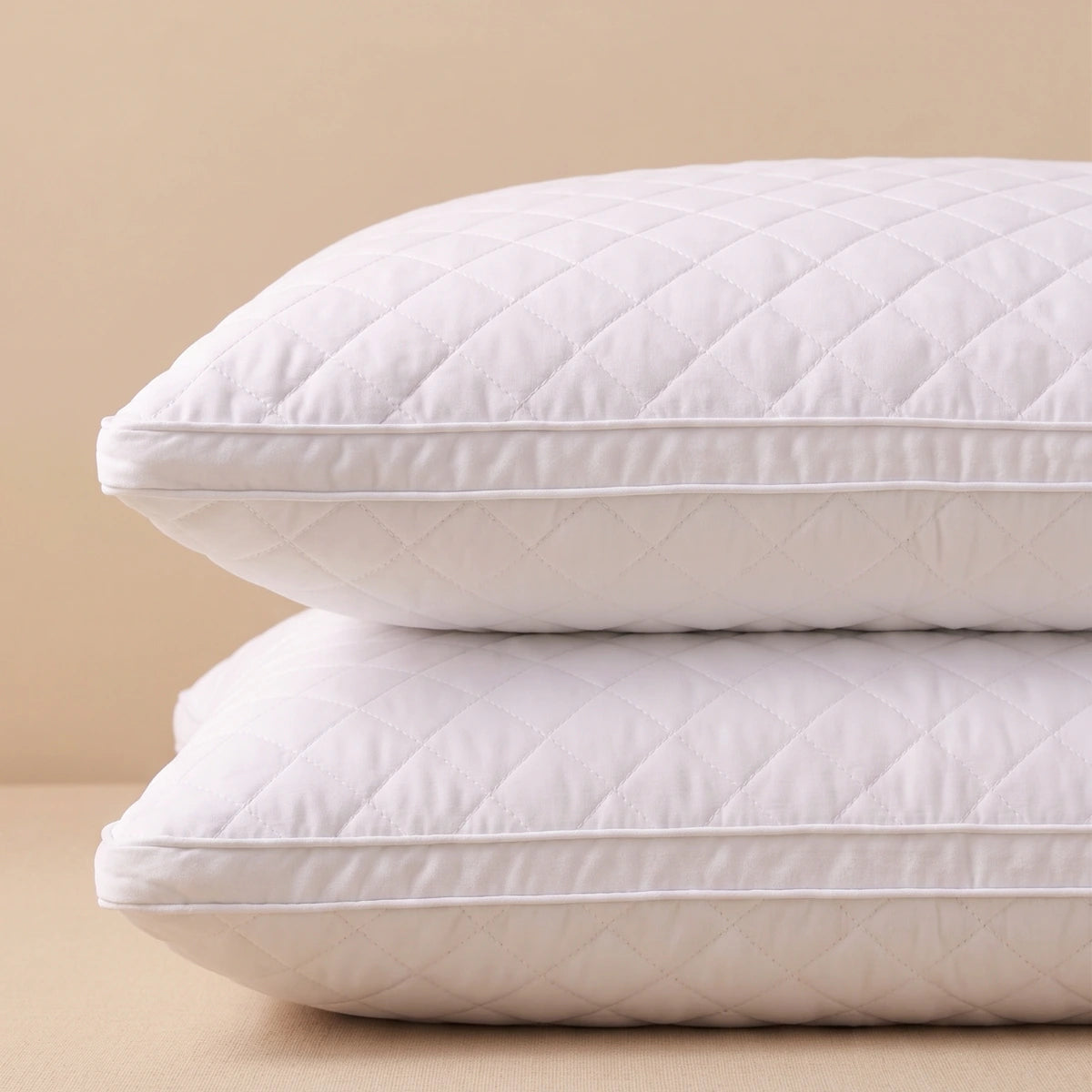 Side profile of LuxeCotton Quilted Pillow showing full loft and thickness of hollow siliconized fiber filling

