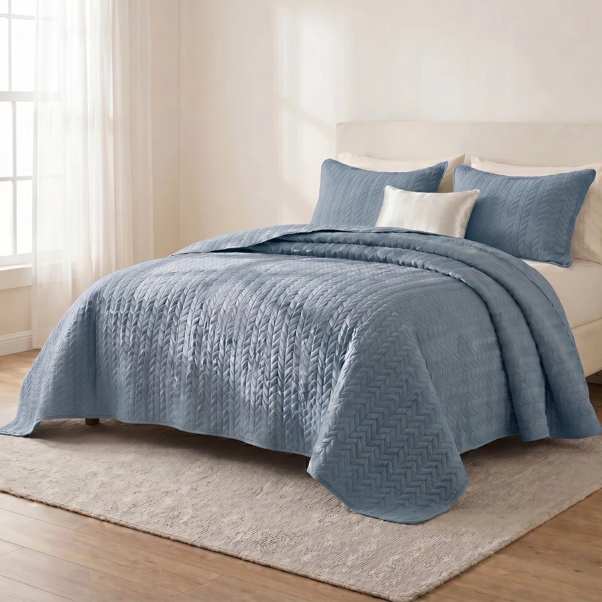 LuxeCotton Horizon Blue quilted bedspread on king size bed lightweight summer quilt with matching pillow shams, Pakistan