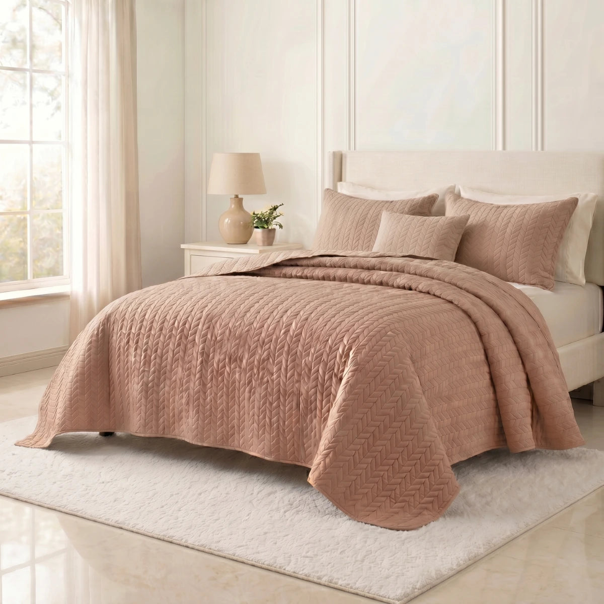 LuxeCotton Rosé Peach quilted bedspread on king size bed lightweight summer quilt with matching pillow shams, Pakistan
